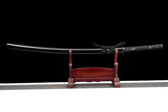 Katana with o-kissaki and demon theme tsuba. Oni Samurai sword