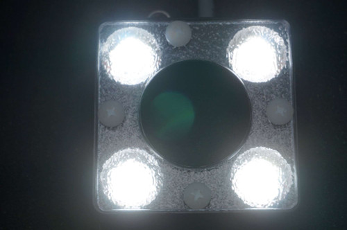 Spectrum Illumination MRL2.5 ring light with 4 white LEDs illuminated, showing clear lenses, minimal housing wear.