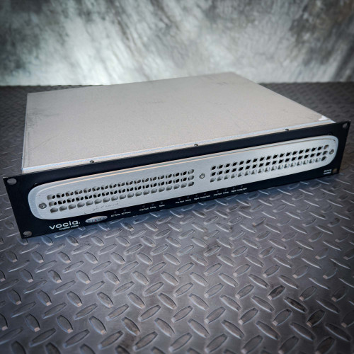 Angled front view of a Biamp Vocia VA-2060e 2-Channel CobraNet Network Amplifier from Obtainium Science and Surplus, showing the vented front panel and rack-mount frame.
