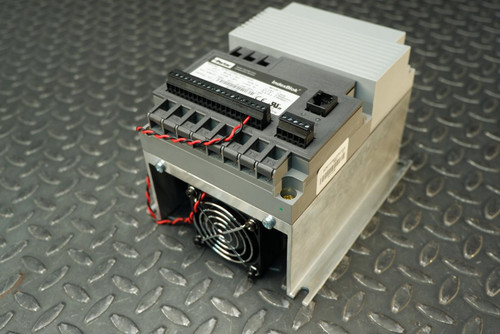 Parker IndexBlok XDM1105E sensorless drive with cooling fan, terminal blocks, and heat sink fins.