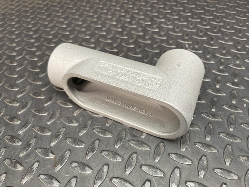 Crouse-Hinds Conduit Body LB57 1-1/2 inch with visible embossed text on its silver surface.
