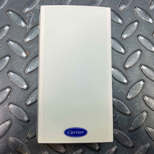 Carrier ZS-C-CAR zone sensor, white rectangular unit with blue Carrier logo at the bottom.