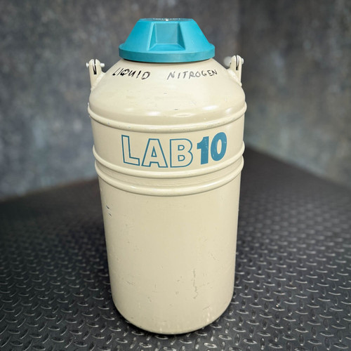 Cream aluminum body with blue LAB10 markings; handwritten LIQUID NITROGEN on neck. Scuffs on lower body. Blue cap present.