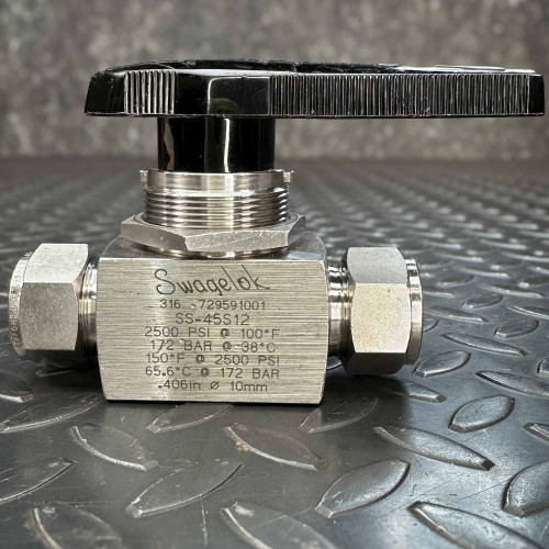 Swagelok SS-45S12 3/4 inch stainless steel ball valve with black handle and visible specifications on the body.