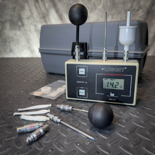 Reuter-Stokes The Wibget RSS-214 Heat Stress Monitor from Obtainium Science and Surplus shown with sensors, probes, and accessories laid out beside a gray carrying case.