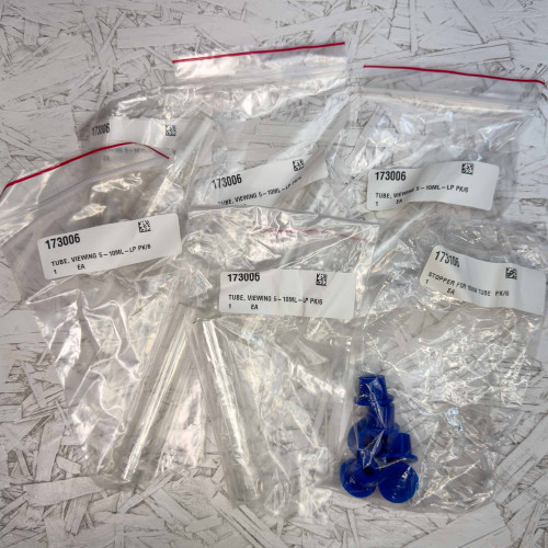 5-Pack, Hach 173006 Viewing Tube 5 mL / 10 mL Marks with Stopper from Obtainium Science and Surplus shown in clear plastic bags, each labeled with part numbers 173006 and 173106.