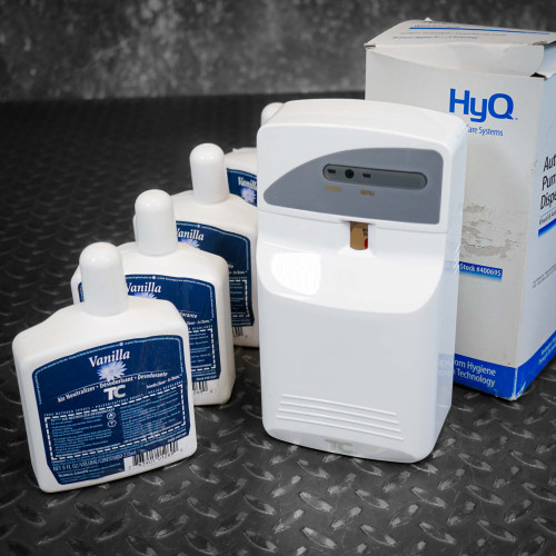 HyQ AutoFresh 400695 dispenser with four vanilla spray refills and original box packaging.