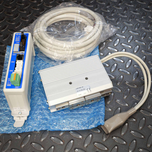 SMC LEHF20K2-48 gripper, LECP6PD controller, and interconnect cable kit displayed on bubble wrap.