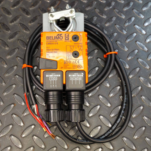 Belimo LMB24-3-S 24V damper actuator showing the orange body, direct coupling clamp, and auxiliary switch connectors.