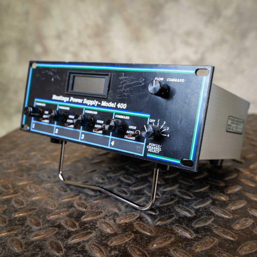 Hastings Power Supply-Model 400 front panel showing moderate scratching and scuffing. All knobs and switches present.
