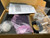 White ceiling microphone unit visible with Polycom-labeled bag marked "P/N 4-2407-20701-024," black cable coil, and documentation sheet.