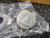 White perforated spherical body with Polycom logo and red emblem visible. Small silver cap on top. No visible wear or damage.