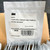 Close-up of a single sealed packet labeled “3M 6600-S Connctr LC MM Hot Melt Simplex 900 BTW WH Boot” from Obtainium Science and Surplus, resting on top of others in a box.