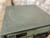 Heavy scratch pattern across full top panel surface; "Rheotronic" and red digital display visible on front face.