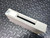 A National Instruments NI SCXI-1302, 50-Pin Terminal Block from Obtainium Science and Surplus, displayed at an oblique angle highlighting its compact design. The device rests on a textured metal surface.