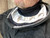 Close-up of the used 3M L-127 leather welding shroud collar showing the H-126 inner shroud lining.