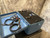 Zetec instrument in its blue case with the lid open beside cables and patches