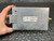 PolyPhaser IS-TT50HN-B label showing "Jan 02" date, "380 to 430MHz @ 750W", minor scuffs on aluminum case, N-type connectors intact.