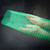 Two hands holding and stretching a section of green Poly-Net HDPE Protective Mesh Netting Tube from Obtainium Science and Surplus.