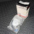 White-face 2-inch gauge visible in clear bag; box marked 151142 and 02/01/03/10 with AMETEK U.S. GAUGE DIVISION labeling.