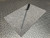 Slender shaft with black multi-component handle; light surface wear consistent with normal use; no visible damage or deformation along full length.