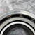 Stamped NACHI on outer race face; open design with ball complement visible; bright ground steel finish, no visible wear or corrosion.