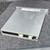 Brushed aluminum enclosure with label reading NATIONAL INSTRUMENTS and CNT14; multi-pin edge connector and two white keyed connectors visible on front edge.
