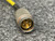 Norwood III-35-P pressure sensor's 5-pin connector with yellow cable on a gray surface.