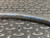 Caterpillar 8N1186 hydraulic hose with model numbers 1E0716 and MSHA IC-146/16 printed in blue text.