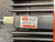 Side label on Warner Electric EM-50-20FBB Electromagnetic Brake from Obtainium Science and Surplus, displaying manufacturer information from Warner Electric Brake & Clutch Company.