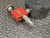 Side view of the MSA AUDI-LARM Tester from Obtainium Science and Surplus, highlighting the red block and silver metal connector fittings.