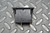 Black molded rocker body marked "E·T·A" and "GERMANY" on face; two gold-tone pins visible; no visible damage or markings obscured.