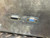 Panel rear showing "SERIAL DATA" 15-pin D-sub and "AUTO CONTROL" 9-pin D-sub connectors, both intact. Surface has scuffs.