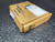 Carton corner with Rockwell Automation print, white label and handwritten numbers