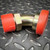 Split flange elbow adapter with red caps on both ends