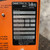 A closeup image of the orange Dimetrics Orbital Welding Centaur 75 TIG Welder Model 7001 product label, detailing its operational specifications. The silver data plate clearly displays DIMETRICS INC., Talley Industries, with a Model No. 7001 and Serial No. 686. Key specifications for this industrial welding equipment include Voltage Input 117 VAC, 60 Hz, 1 Phase, and Voltage Output 35 VDC, 2.4 KVA. The label also shows Assembly No. 22110001G1 and a Mfg Date of 285 (February 1985), indicating its vintage as a Made in USA power source for TIG welding applications.