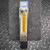 Unused ColeParmer NO2213ST stainless steel flowmeter, a precise variable area rotameter, displayed vertically. The industrial measurement device features a transparent clear housing showcasing a vibrant yellow scale, numbered 20 to 60, with an internal float for accurate liquid or gas flow monitoring. Visible details include the ColeParmer brand and Chicago address on the blue top label, and its sturdy construction with stainless steel accents, set against a dark grey textured surface and industrial diamond plate.