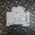 Rear view of the Moeller Circuit Breaker XPole FAZ-C10/2, 10A 2-Pole from Obtainium Science and Surplus, showing a white surface with certification markings, technical details, and a barcode label.