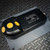 SonTek Argonaut SW sensor with three yellow transducer faces resting on a gray plate