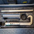 Open toolbox showing long cylindrical metal components and a large C-shaped tool labeled “CONVAL.” Conval TK5D-C-S-1 Tool Kit for Size 5D Valves from Obtainium Science and Surplus.