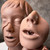Manikin head and replacement face piece showing clean condition, no visible damage or significant wear.