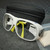 Lumenis AX0000068 laser safety glasses, white frame, yellow arms, and black zippered case.