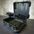 Used field tool case showing internal base and installed wing pallet. Shell and hinges intact, moderate interior wear.