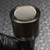 Close-up of the Shure Model 560 lavalier microphone grille and body with visible model text.