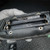 Battery compartment open, S/N 24656, date of MFG 03·06, contacts clean, PBT-GF30 housing, light dust, battery cover removed.