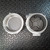 Two-piece aluminum enclosure shown open; interior marked 5950A, 3Y, VOL, CL/UN with cross-shaped mount plate and two screws. Label reads 67-0027-03-02.