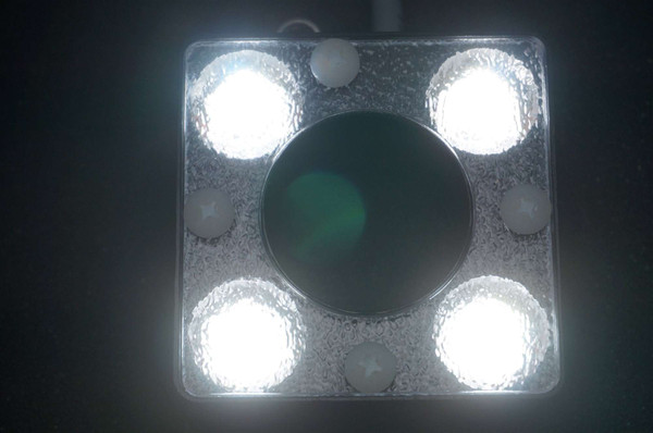 Spectrum Illumination MRL2.5 ring light with 4 white LEDs illuminated, showing clear lenses, minimal housing wear.