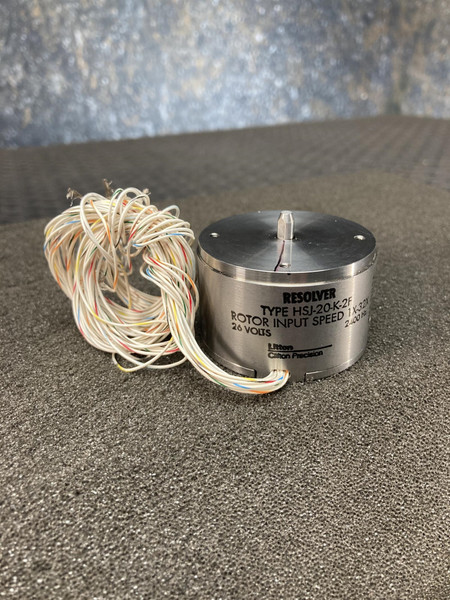 Clifton Precision resolver beside its bundle of color-striped flying leads on gray foam