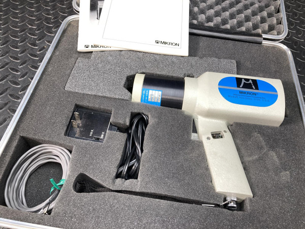 Mikron M80B-0FPH in custom case with charger and coiled gray cable. Label shows "Made in U.S.A." Manual included.