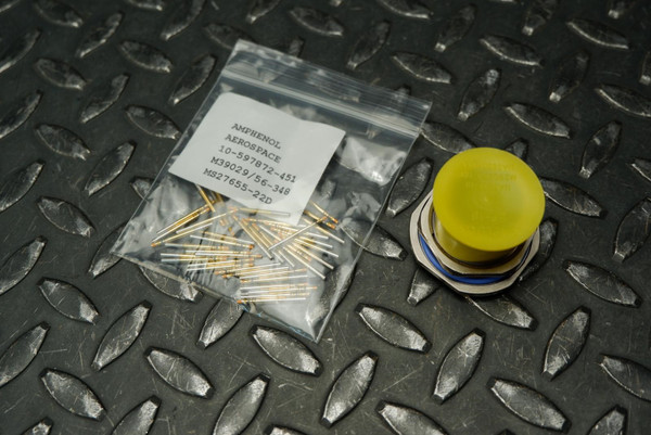Amphenol MS27468T15F35S connector with yellow protective cap and bag of M39029/56-348 contacts.
